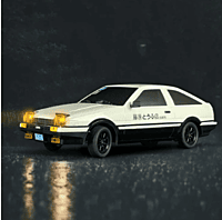 LDRC Model A86 1/18 white Toyota AE86 RC drift car front view with pop-up LED lights raised
