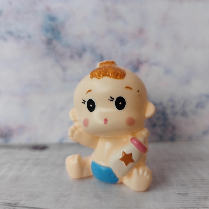 Sitting Boy Baby Bottle