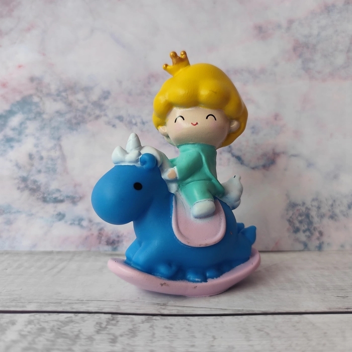 Small Boy King on Blue Unicorn Toy