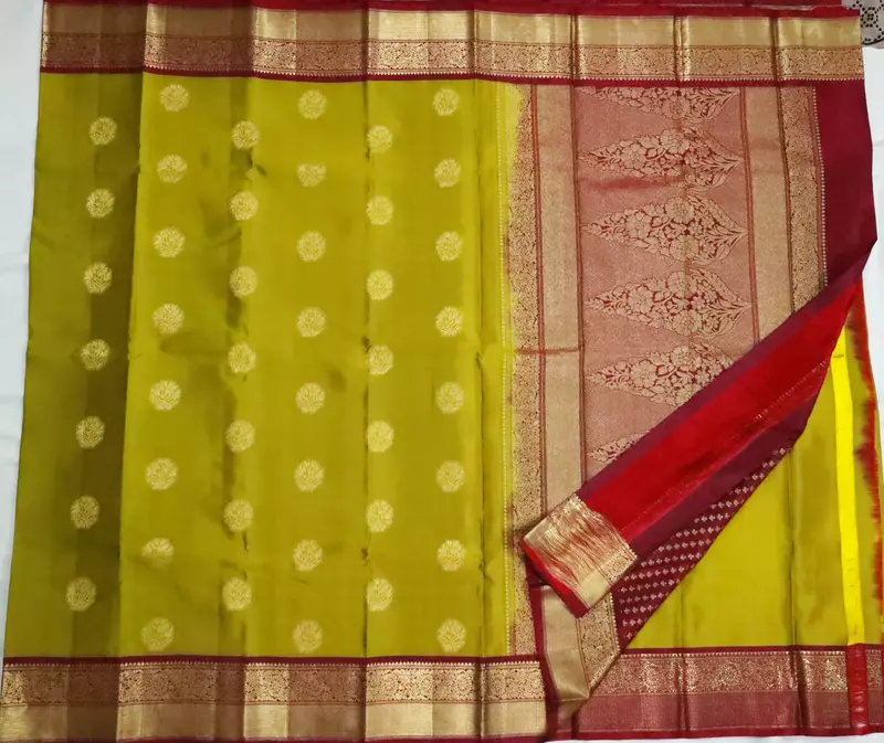 Olive green silk saree with cranberry zari border