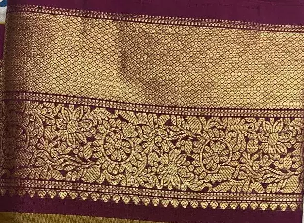 Olive green silk saree with cranberry zari border