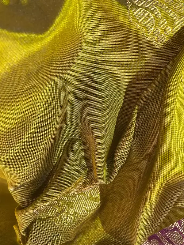 Olive green silk saree with cranberry zari border