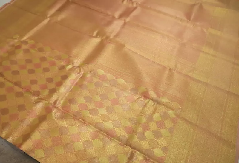 Peach orange Kanjivaram silk saree with zari border