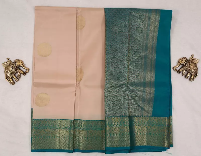 Scream silk saree with teal zari border