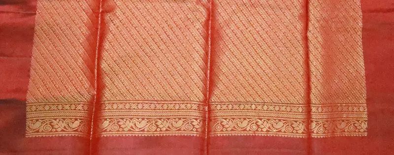 Navy blue soft silk saree with maroon zari border
