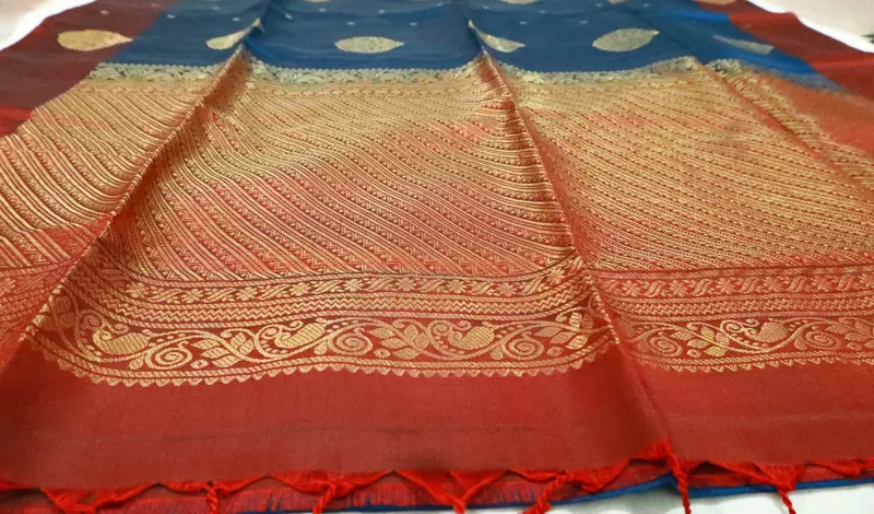 Navy blue soft silk saree with maroon zari border