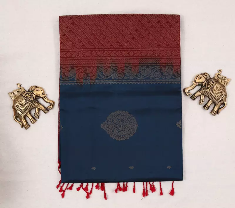 Navy blue soft silk saree with maroon zari border