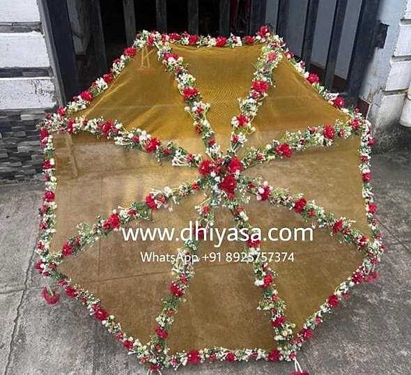 Umbrella with artificial flowers