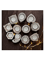 Close-up of scented wooden tea light candle holder