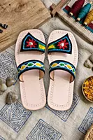 Women's hand-embroidered black leather slide chappal with floral motifs, Chamba — Yatrika Crafts