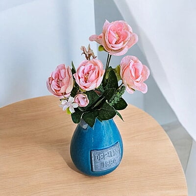 Blue Ceramic Vase with "Depuis 1884" Detail