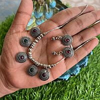 Silver finished chain with ruby stone pendant