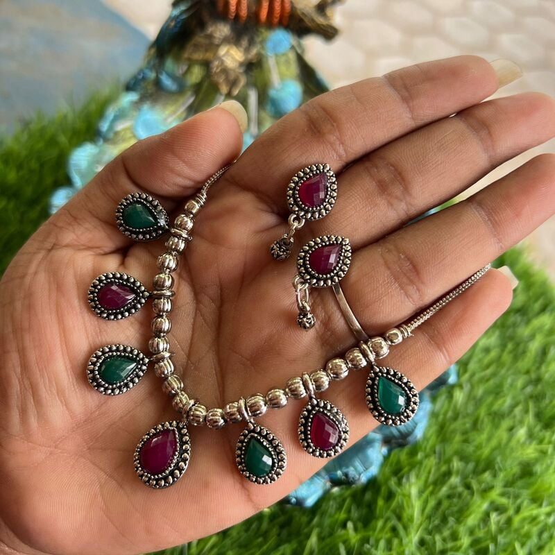 Silver finished chain with ruby stone pendant