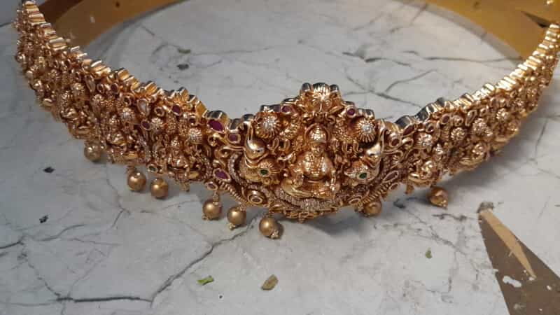 gold based elephant with lakshmi design hipblet