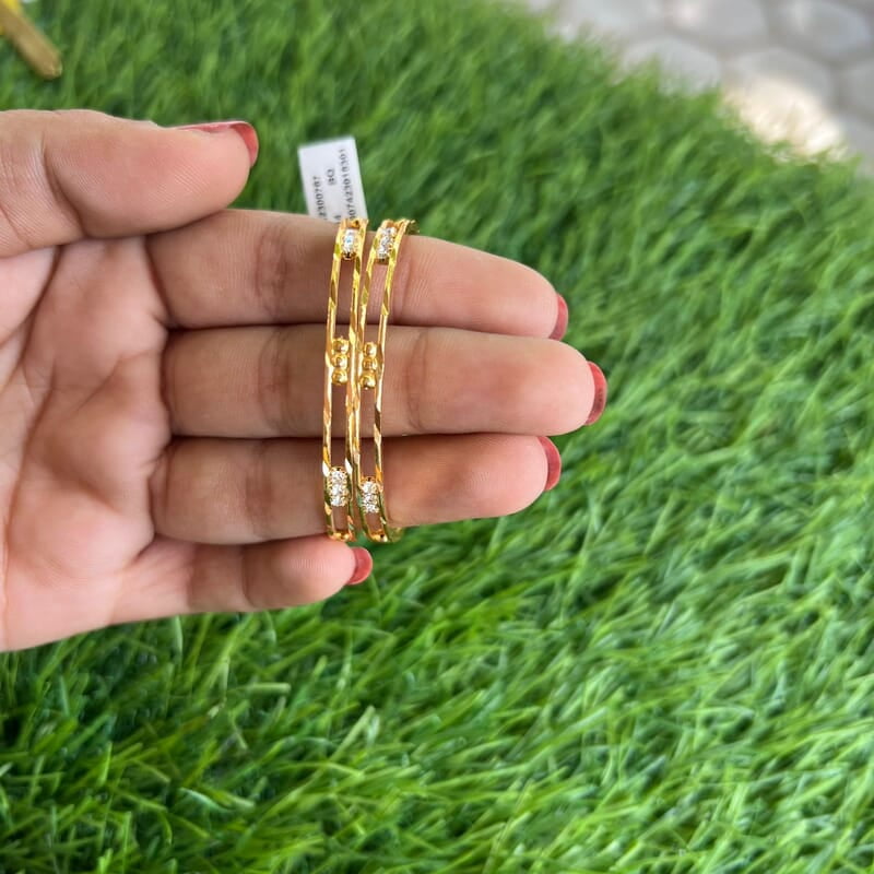 Two Layered gold plated kids bangle with Gold Ball