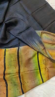 Black and flames hand batik on Mulberry silk saree from Mystic radiance collection