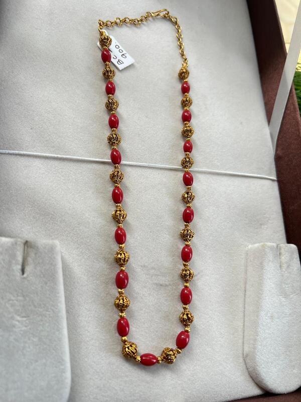 RED PAVALAM WITH GOLD BALL CHAIN