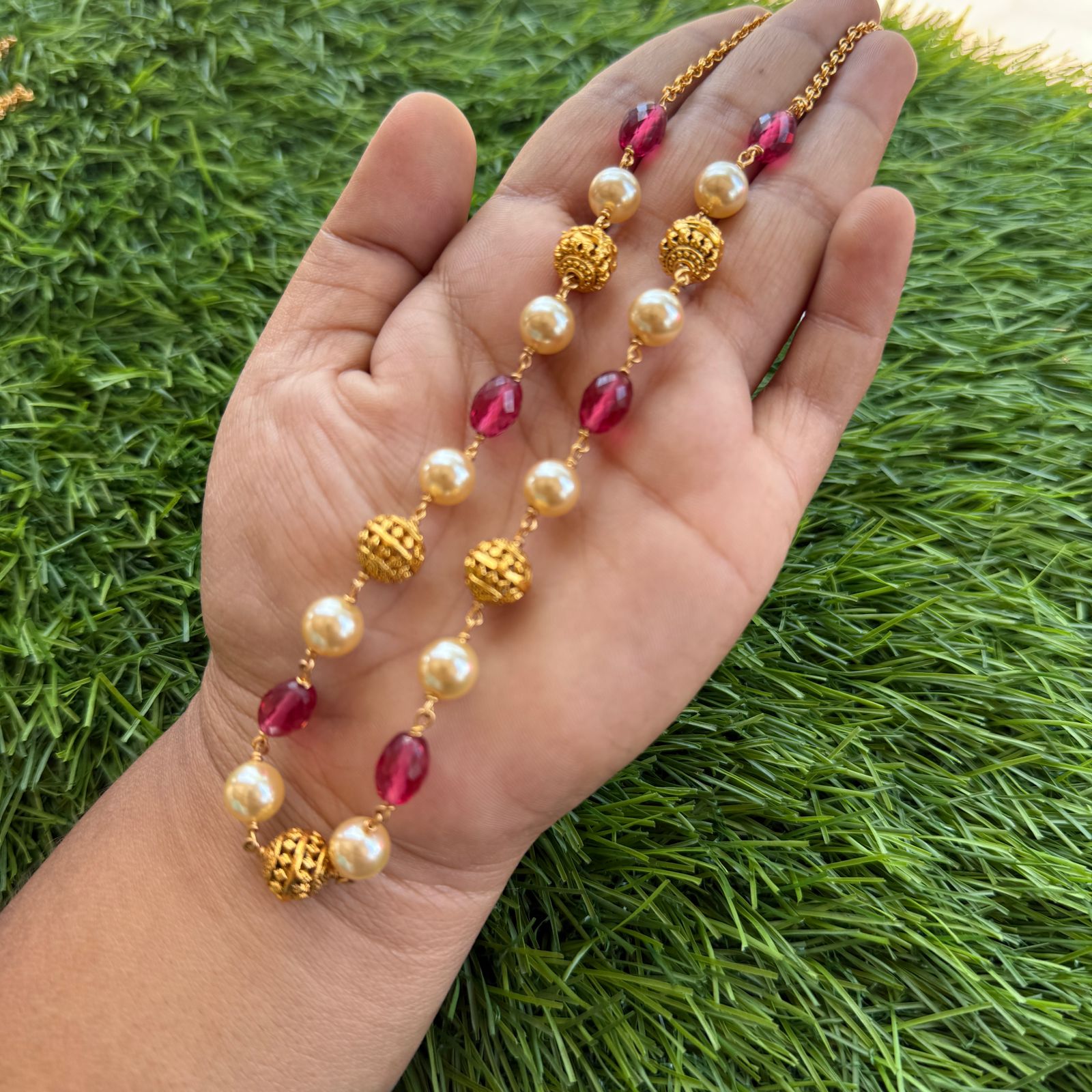 gold and off white pearl chain