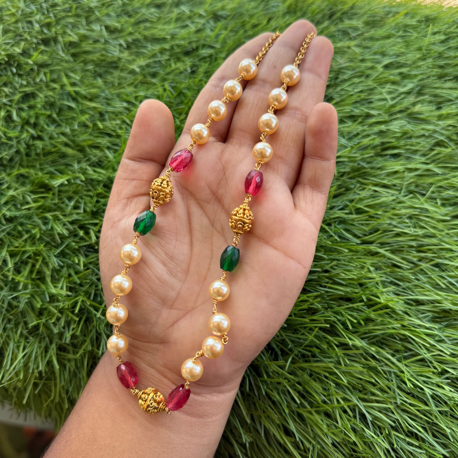 gold and off white pearl chain