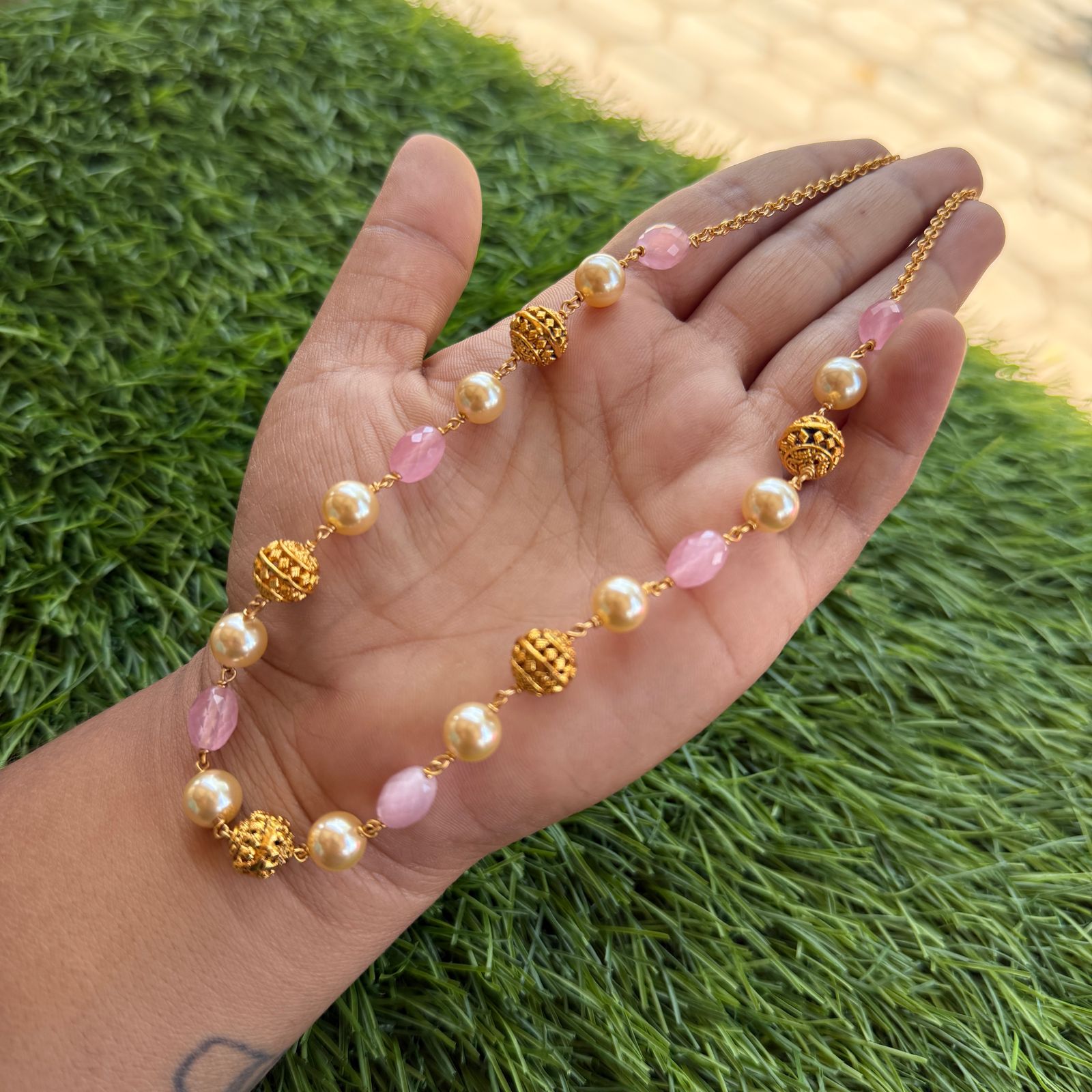 gold and off white pearl chain