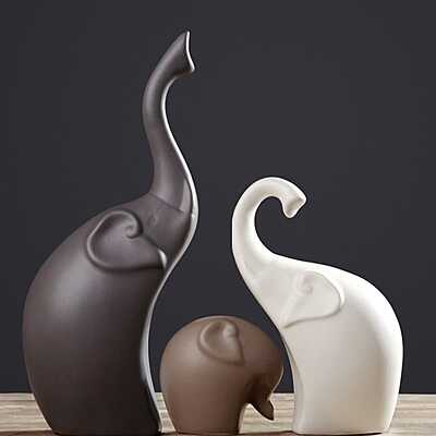 A family of three Elephants