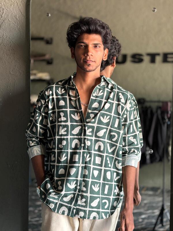 Green and white printed shirt