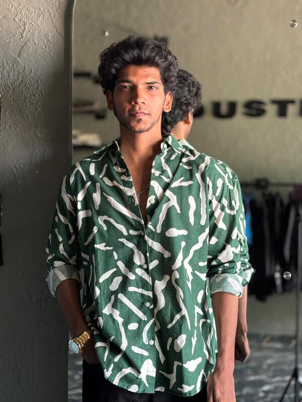 Green and white printed shirts