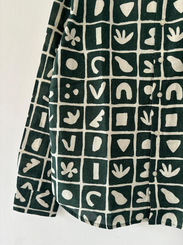 Green and white printed shirt