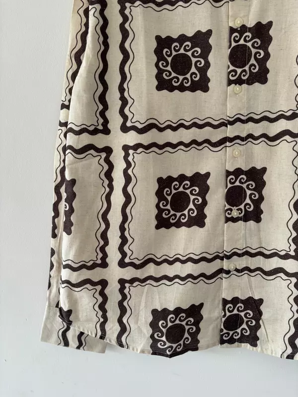 White and brown printed shirt