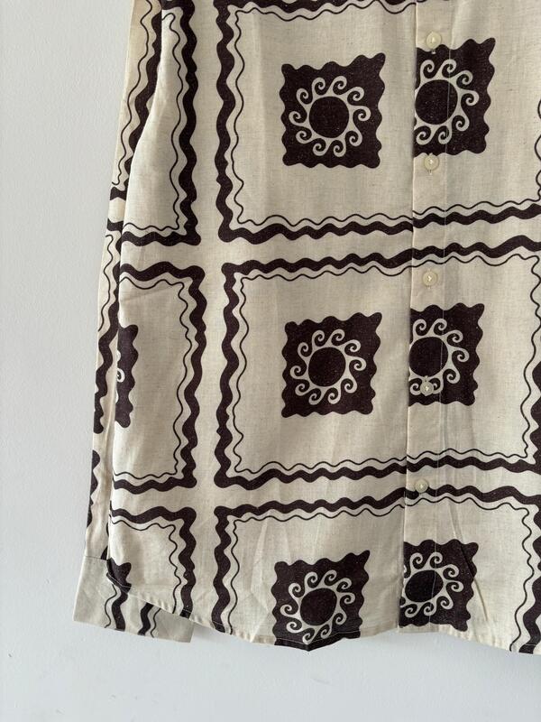 White and brown printed shirt