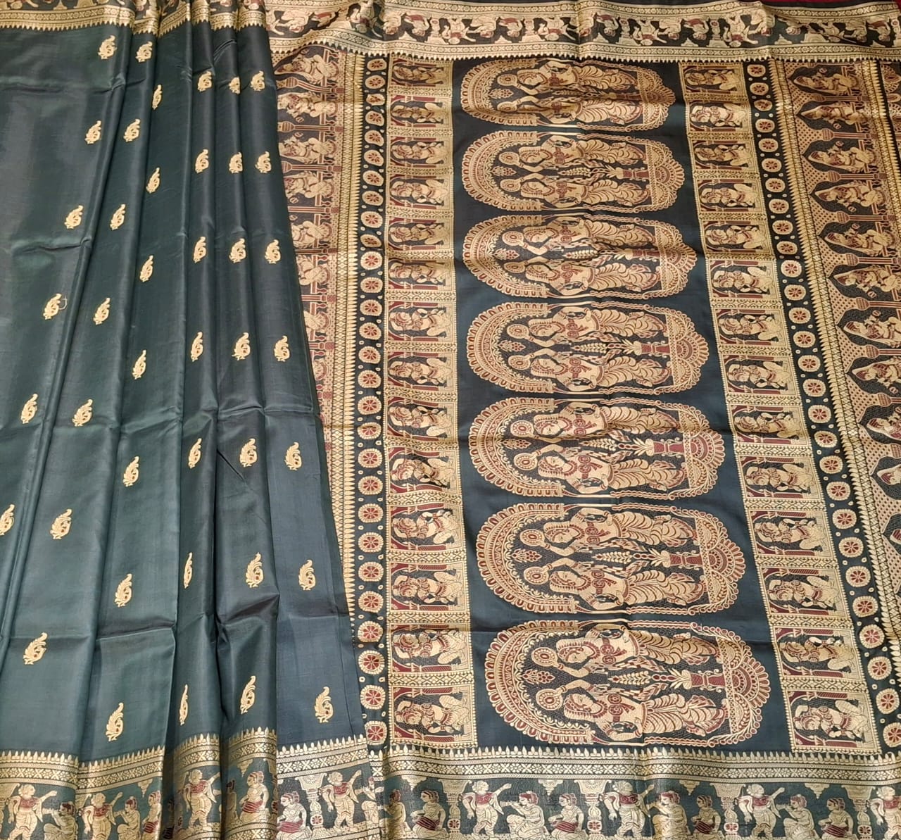 Figure motif Baluchari saree in color petrol green