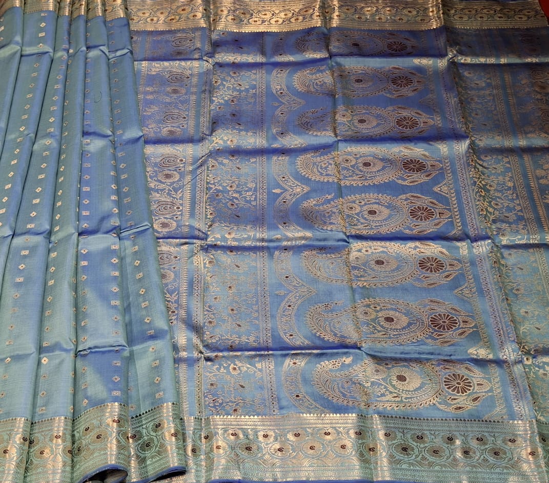 No figurine motif 2000 buta Swarnachari Powder blue color saree No figurine motif 2000 buta Swarnachari Powder blue color saree