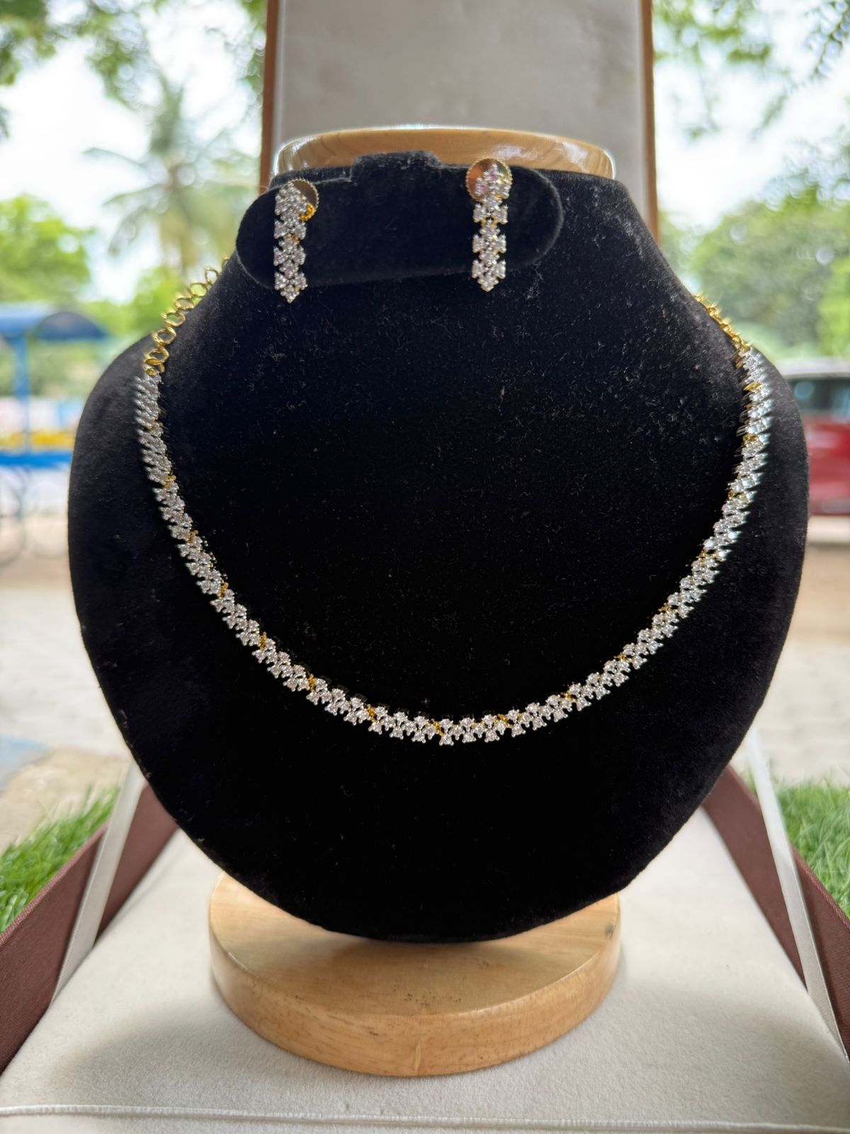 Fancy drop and floral design with pearl neckpiece