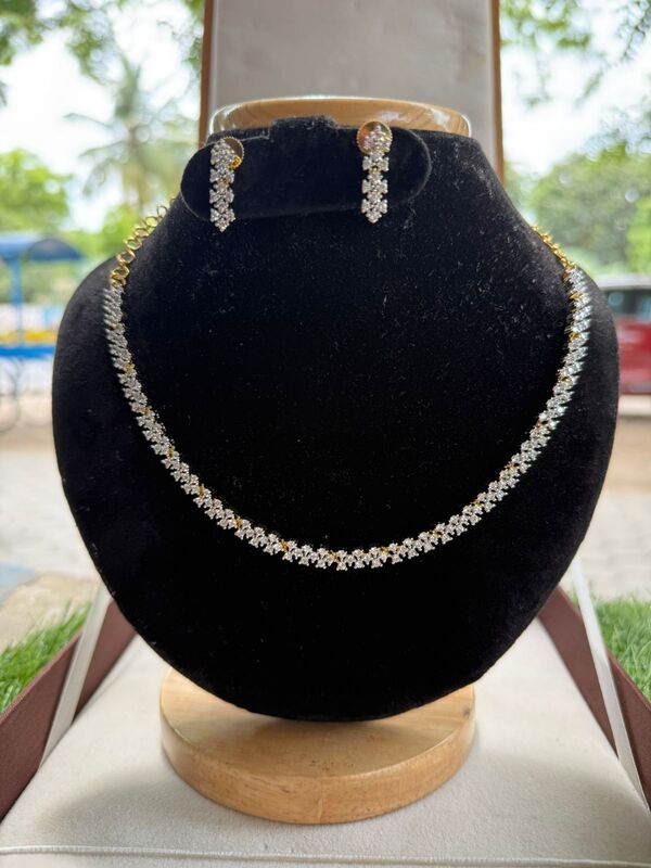 Fancy drop and floral design with pearl neckpiece