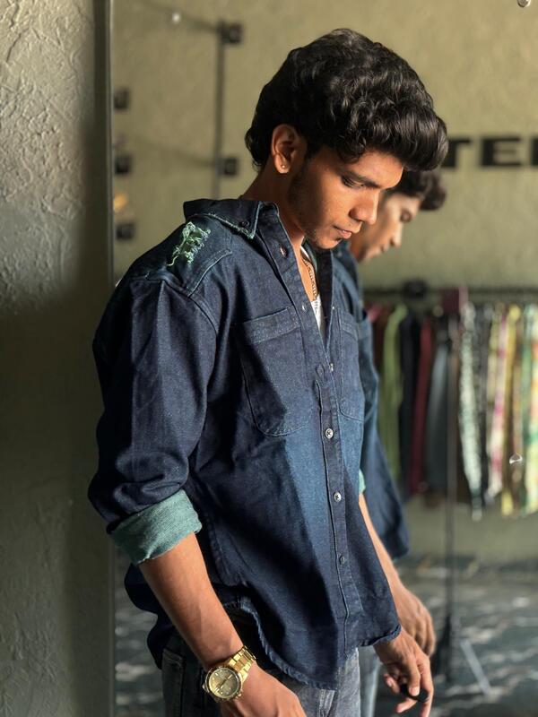 Dark blue distressed denim shirt