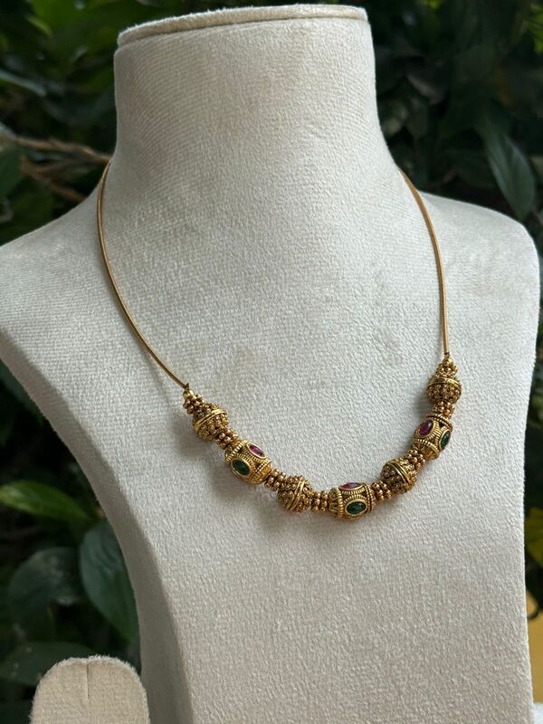 Lotus peatal design with green stone