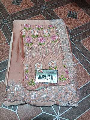 Siroski Stones Saree Cream Colour With Maggam Work Blouse