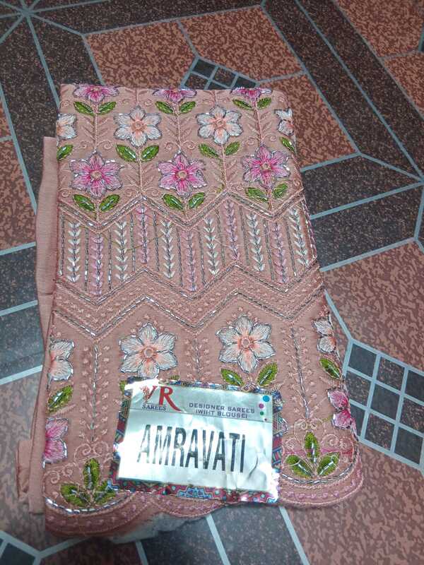 Siroski Stones Saree Cream Colour With Maggam Work Blouse