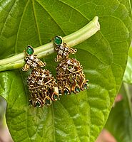 Emerald Jhumka  Light weight gold finish premium earrings