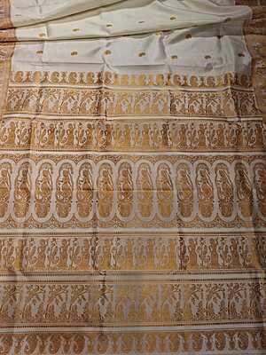 Off white body color with gold colour thread motif pure Mulberry silk Baluchari saree