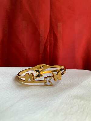 Fluttering Elegance: Multi-Tone Butterfly Bangle Fluttering Elegance: Multi-Tone Butterfly Bangle