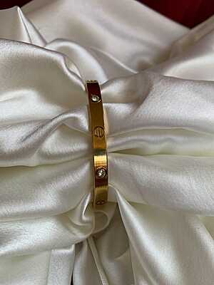 Iconic Screw & Diamond Bangle