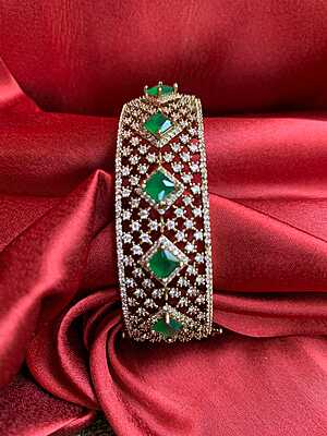 Elegant Emerald and Diamond Cuff Bracelet Elegant Emerald and Diamond Cuff Bracelet