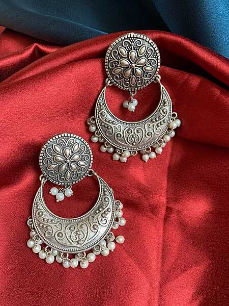 Elegant Oxidized Silver Chandbali Earrings with Pearl Accents Elegant Oxidized Silver Chandbali Earrings with Pearl Accents