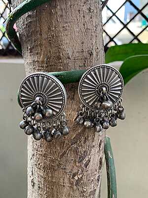 Celestial Sunburst Oxidized Silver Studs with Cascading Ghungroo Droplets Celestial Sunburst Oxidized Silver Studs with Cascading Ghungroo Droplets