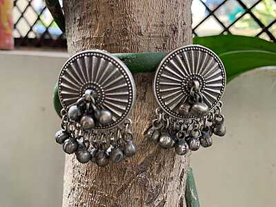 Celestial Sunburst Oxidized Silver Studs with Cascading Ghungroo Droplets Celestial Sunburst Oxidized Silver Studs with Cascading Ghungroo Droplets