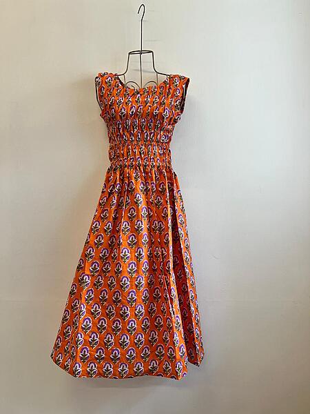 Sayesha's Sleeve less Triple smocked dress - Orange & Purple Flowers