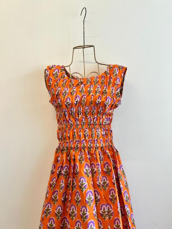 Sayesha's Sleeve less Triple smocked dress - Orange & Purple Flowers