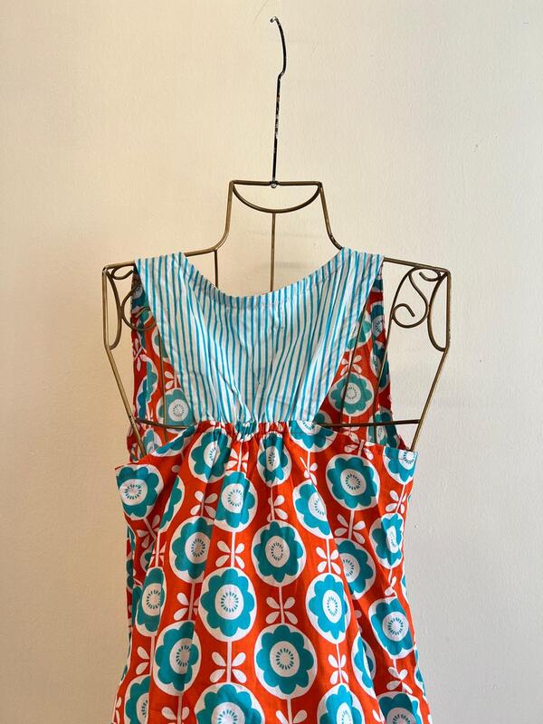 Seher's Short A-line with Patch-Back - Orange with Blue Flowers