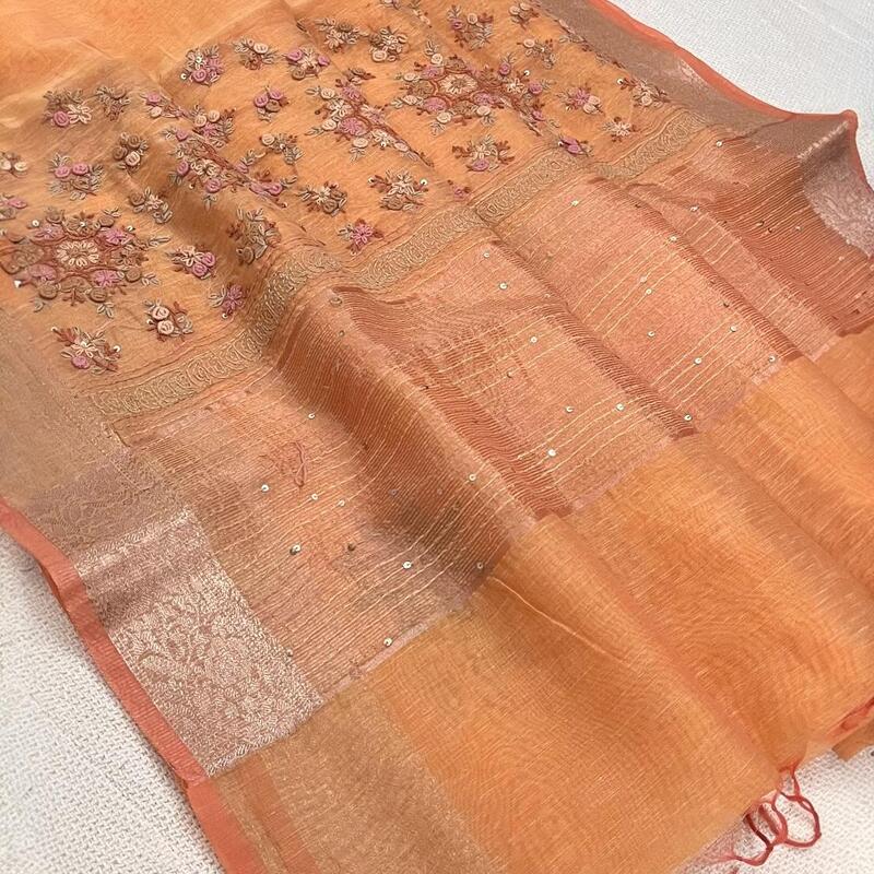 Peach-Orange Tissue Linen Saree with Intricate French Knot Embroidery and Zari Borders